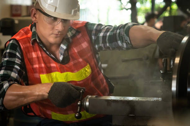 istock Smart factory worker or engineer do machine job in a manufacturing workshop 1303547038