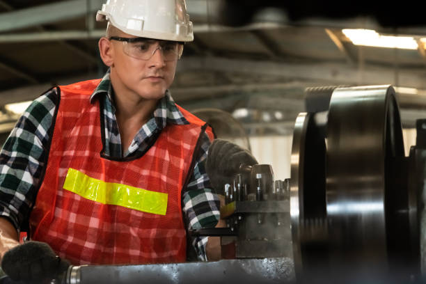 istock Smart factory worker or engineer do machine job in a manufacturing workshop 1303547173