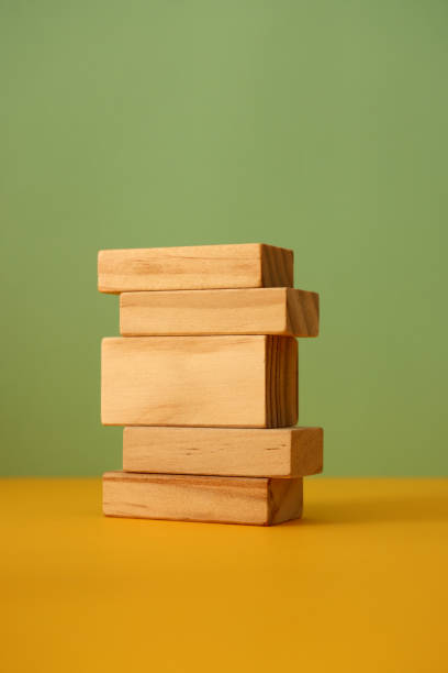 istock Wood blocks on color background 1303549904