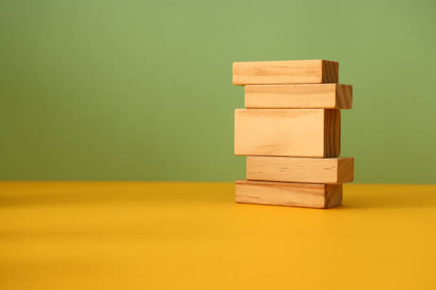 istock Wood blocks on color background 1303549935
