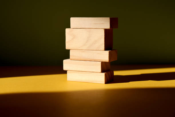 istock Wood blocks on color background 1303549971