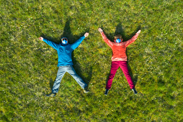istock Together Through COVID-19 Pandemic, Couple in Funny Pose 1303551948