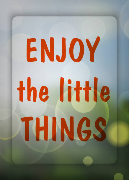 istock Enjoy The Little Things Enjoy on the natural blurry background. 1303555686