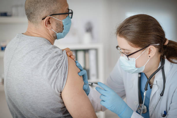 istock doctor and patient in a medical office 1303556802
