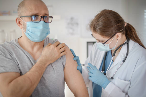 istock doctor and patient in a medical office 1303557059