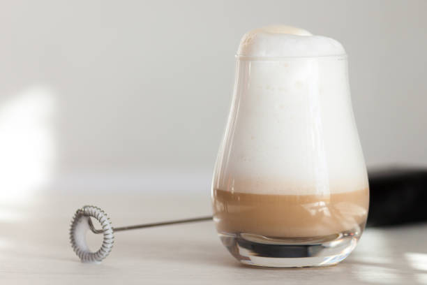 istock Milk foam maker. Mini blender, frothers for coffee, latte 1303558413