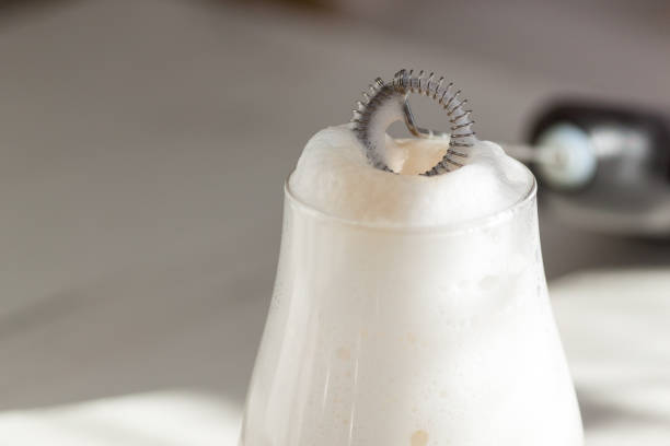 istock Milk foam maker. Mini blender, frothers for coffee, latte 1303558453