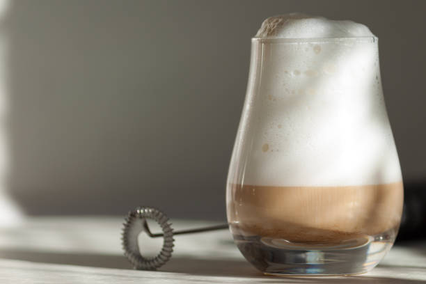 istock Milk foam maker. Mini blender, frothers for coffee, latte 1303558475