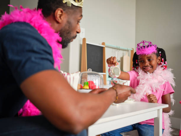 istock Dad and Daughter Tea Party 1303559267