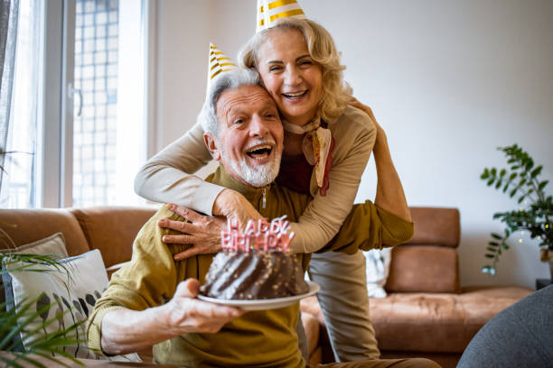 istock Senior couple at home, celebrating birthday 1303563338