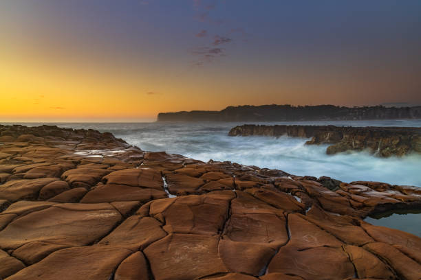 istock Early Morning Seascape from Rock Platform 1303569359