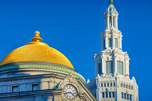 Two beautiful landmark buildings in downtown Buffalo: the old Buffalo Savings Bank building with the gold gilded dome and the Electric Tower office building, NY, USA.