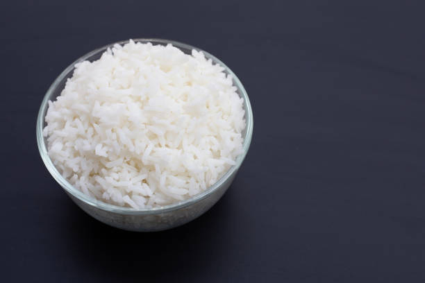 istock Dish of rice on white background. 1303571222