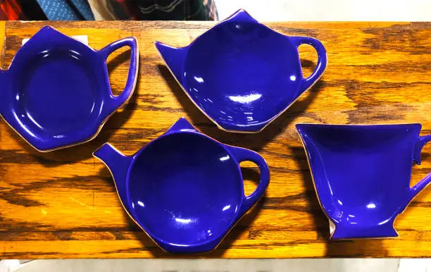 Blue vintage saucers in different mug shapes