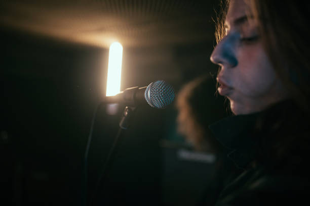 istock Male vocalist on bend rehearsal 1303574041