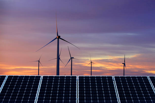 istock Solar photovoltaic panels and wind turbines 1303578873