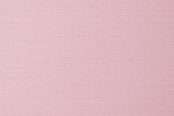 istock Cotton silk blended fabric wall paper texture pattern background in pastel sweet pink old rose color tone 1303581681