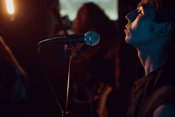 istock Male vocalist on bend rehearsal 1303588722
