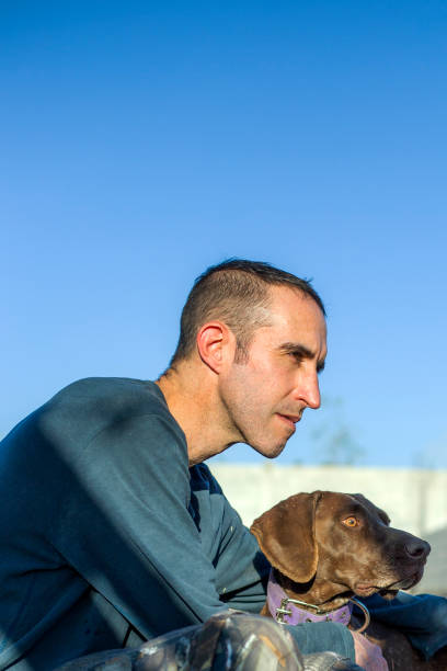 Man with his dog outdoors