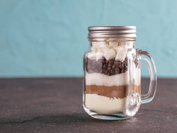 istock Hot chocolate mix in mason jar with copy space 1303599386