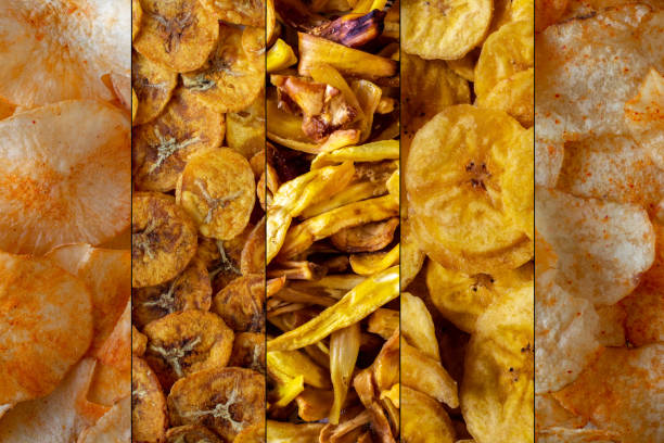 Variety chips of potato, banana, jackfruit and cassava. Kinds of common chips both sweet and tangy Variety chips of potato, banana, jackfruit and cassava. Kinds of common chips both sweet and tangy kerala photos stock pictures, royalty-free photos & images
