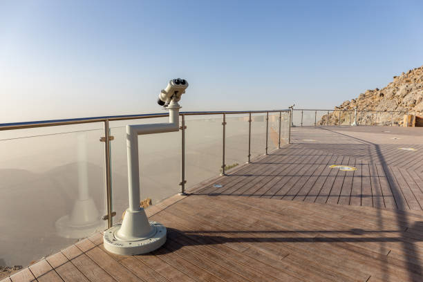 istock Jebel Jais Viewing Deck Park with coin operated binoculars overlooking Hajar Mountains, UAE. 1303610327