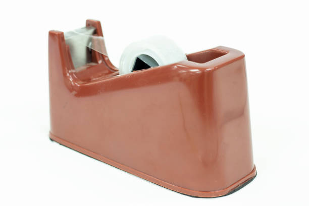 istock Adhesive tape dispenser separately on white background. 1303613972