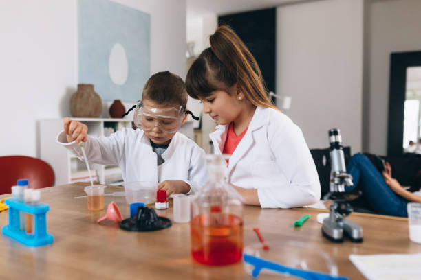 istock children do chemical experiments at home 1303616152