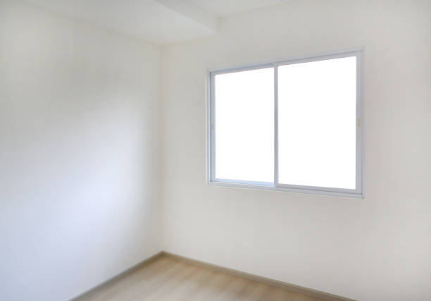 istock window in empty room of the new house 1303616157