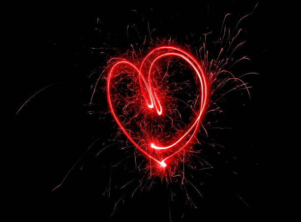 istock Light streaks valentine love red heart 1303619654