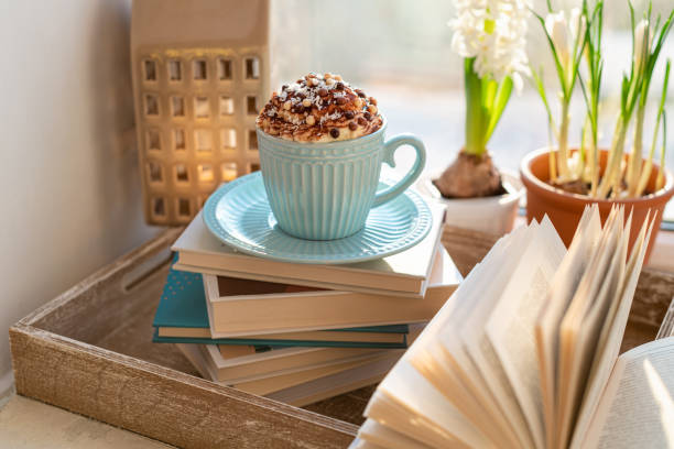 Open book on old wooden table