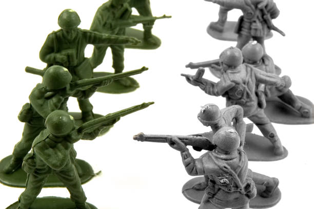 istock toy army men standing at odds 1303628250