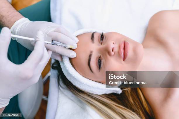 Beauty Treatment With Botox Stock Photo - Download Image Now - Forehead, Botulinum Toxin Injection, Wrinkled