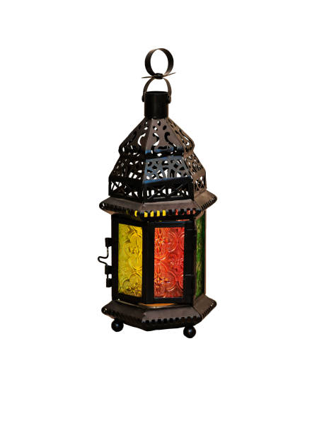 istock Ornamental Arabic lantern with burning candle glowing. Festive greeting card. Invitation for Muslim holy month or christmas, halloween holidays 1303632257