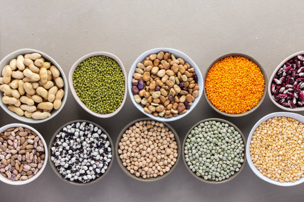istock Different types of legumes in bowls 1303641886