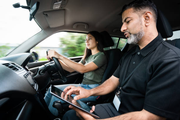 istock Teaching the valuable skills to new driver. 1303641975