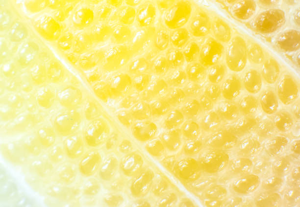 istock Grapefruit texture inside on the white background. Citrus close up photo. Healthy lifestyle photo. Beautiful wallpaper. Vegetarian and vegan concept. Vitamins from nature. 1303644650