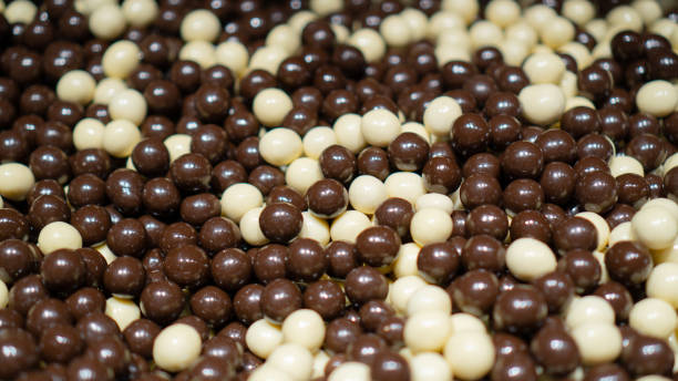 istock Chocolate paradise. Assorted mini malted milk balls. Panned milk white dark chocolate candy. 1303644933