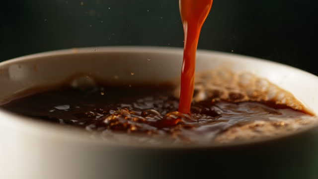 SLO MO LD Coffee being poured into a cup
