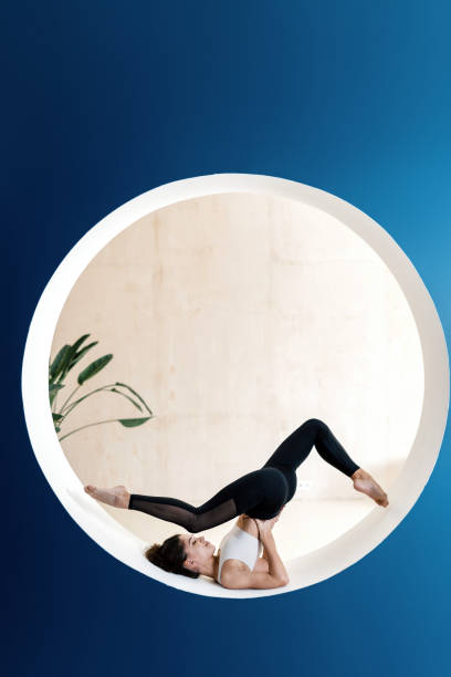 istock Sporty woman training alone in yoga class 1303653013