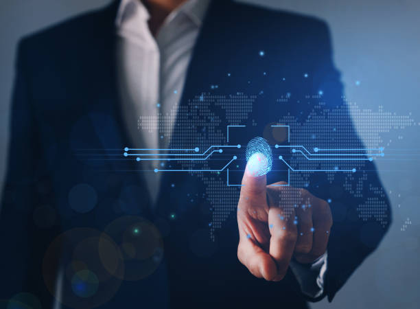 istock Businessman using fingerprint indentification to personal access. Global cyber attack.  Biometrics security, E-kyc, innovation technology concept. 1303653211