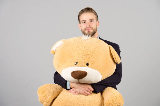 Birthday teddy bear, toy, gift, present concept Birthday teddy bear, toy, gift, present concept. Birthday, anniversary, holiday celebration. valentines day man with teddy bear stock pictures, royalty-free photos & images