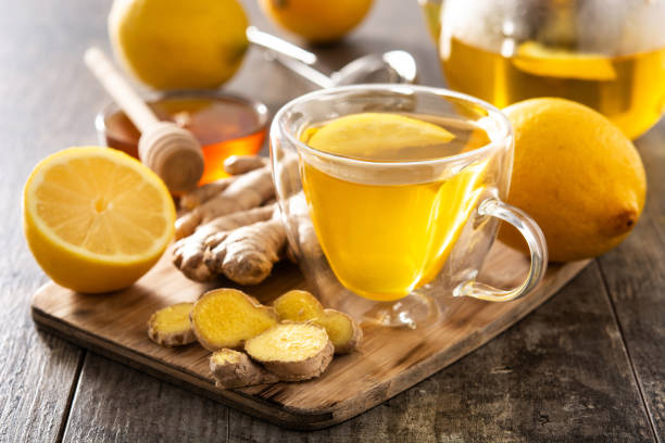 istock Ginger tea with lemon and honey in crystal glass 1303657251