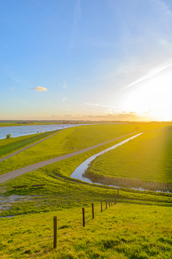 Rural landscape in the IJsseldelta region during an early springtime day near Kampen in Overijssel, Netherlands.