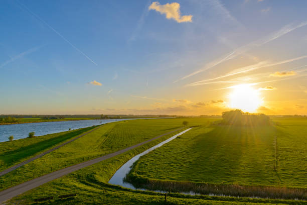 Sunset at the river IJssel during early spring in Overijssel, The Netherlands.
