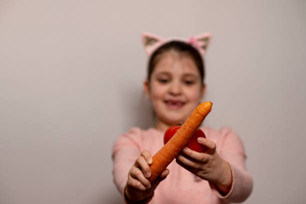 istock Girls with food 1303658740