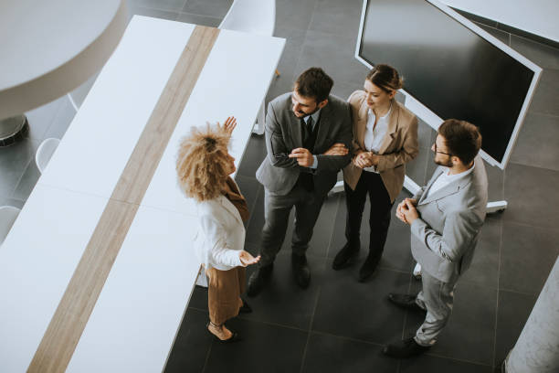 istock Multiethnic business people working together in the office 1303659761
