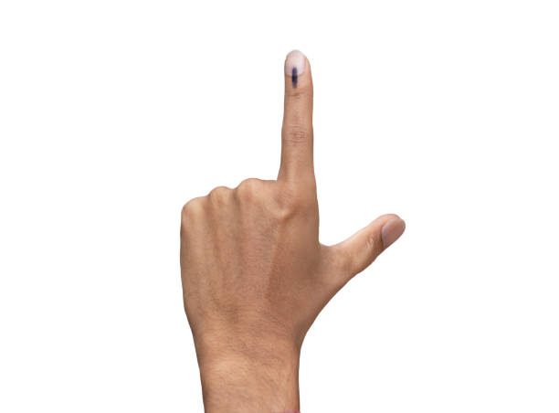 male Indian Voter Hand with voting sign or ink pointing out , Voting sign on finger tip Indian Voting male Indian Voter Hand with voting sign or ink pointing out , Voting sign on finger tip Indian Voting constituency photos stock pictures, royalty-free photos & images