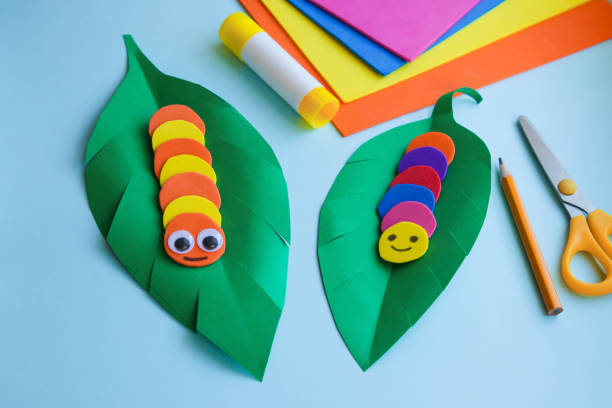 istock Early learning ideas. Caterpillar from paper or eva. Spring Craft from paper. DIY concept. Easy handmade paper crafts 1303659996