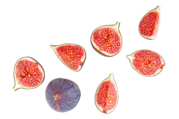 istock Set of fresh whole and sliced figs isolated on a white background, top view. 1303661468